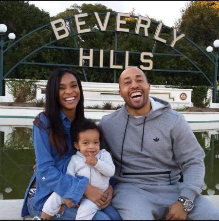 Charles Johnson IV (R), son of TV judge Glenda Hatchett along with his late wife, Kira, and one of their sons.