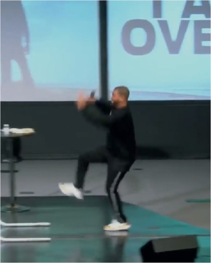 Matthew K. Thompson of Jubilee Church in Boston, Massachusetts, performs a trampoline stunt in December 2018.