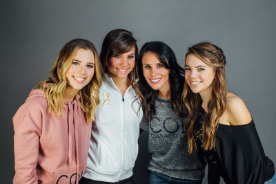 Carla D'Addesi (center-right) and her three daughters pose in COL 1972 clothing. 