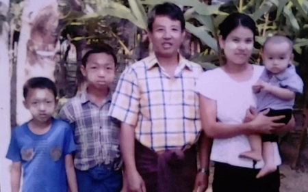 Slain Myanmar pastor Tun Nu poses for a picture with his wife and three children in this undated photograph. 