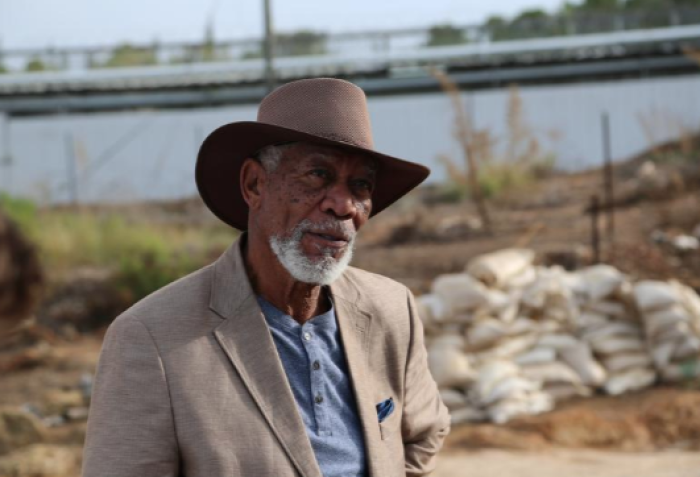 Morgan Freeman poses for a photo at Megiddo Prison in Israel. 