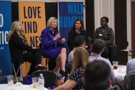 Shirley Hoogstra, president of Council for Christian Colleges and Universities, (holding the mic) at Advocacy Day, sponsored by the Texas Baptists' Christian Life Commission, March 26, 2019.