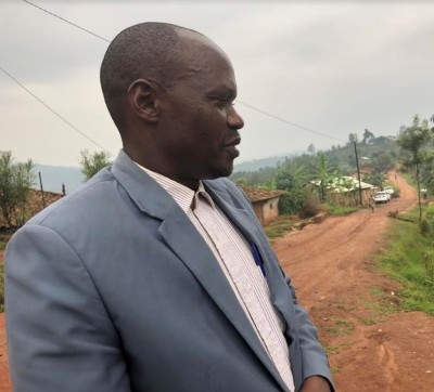 Callixte Karemangingo speaks with reporters in the Nyamagabe district of Rwanda's Southern Province in February 2019. 