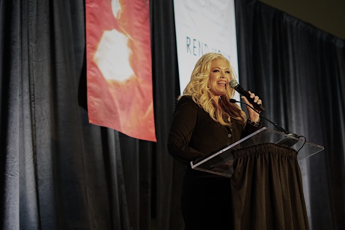 Credit : Elizabeth Johnston, also known as the 'Activist Mommy' on social media, speaking at the Day of Mourning event in Richmond, Virginia on Saturday, April 6, 2019. 