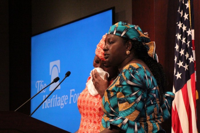 Rebecca Sharibu (L) cries during a panel event at the Heritage Foundation's office in Washington, D.C. on June 11, 2019. She was joined by Gloria Puldu (R) to call on the U.S. government to pressure the Nigerian government to more urgently secure the release of Sharibu's daughter, Leah, from Boko Haram. 