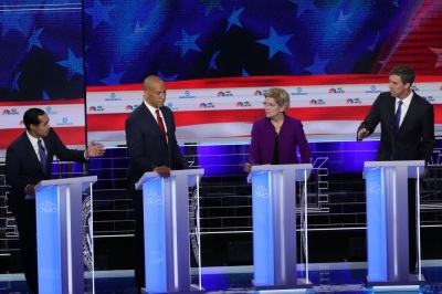 Former housing secretary Julian Castro, Sen. Cory Booker (D-NJ) Sen. Elizabeth Warren (D-MA) and former Texas congressman Beto O'Rourke take part in the first night of the Democratic presidential debate on June 26, 2019 in Miami, Florida.