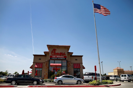 Drive through customers wait in line at a Chick-fil-A restaurant on August 1, 2012 in Fort Worth, Texas. 