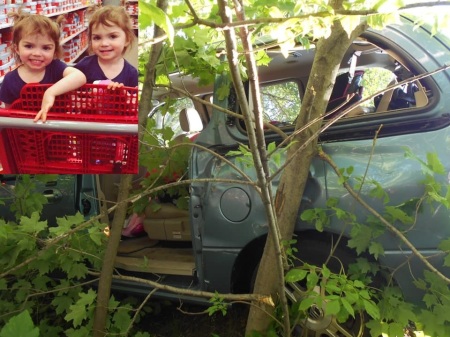 Bella, 2, pictured (inset) with her twin sister, Elena, was trapped inside this van when it rolled down a hill and crashed with her inside on July 11, 2019.