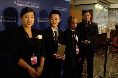 Wai Wai Nu (L) speaks with reporters during the U.S. State Department's Ministerial to Advance Religious Freedom at the Harry S. Truman Building in Washington, D.C. on July 17, 2019. 