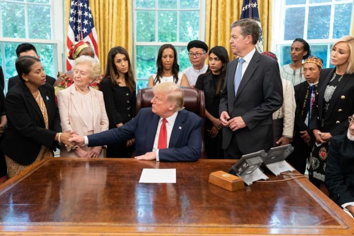 Bangladesh national Priya Saha shakes the hand of U.S. President Donald Trump during a meeting at the White House in Washington, D.C. on July 17, 2019.