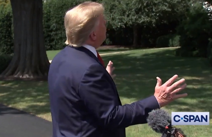 President Donald Trump says 'I am the chosen one,' in remarks before boarding Air Force One on the White House lawn, August 21, 2019.