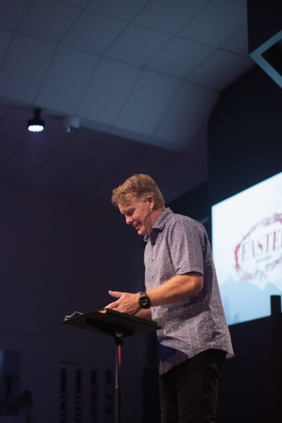 Stock image of pastor preaching.