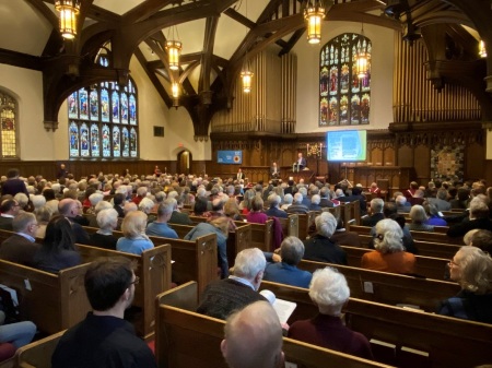 A meeting at Plymouth Congregational Church of Minneapolis, Minnesota, to decide whether to keep a large embroidery banner known as 'Churchmen in the New World' on display. The church voted on Nov. 10, 2019, to remove the tapestry, which had been on display at the church since 1974. 