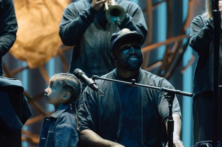 Kanye West and his daughter North at Lakewood Church.