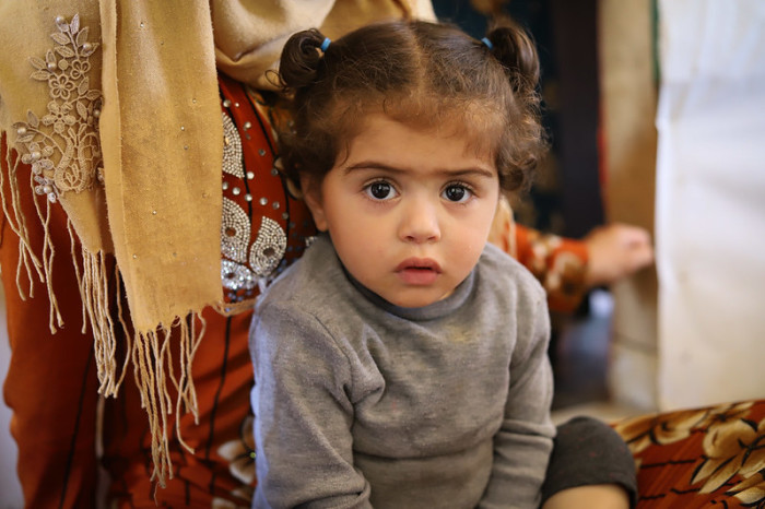 A Syrian refugee with her teenage mother in the Zahle refugee camp of Lebanon.