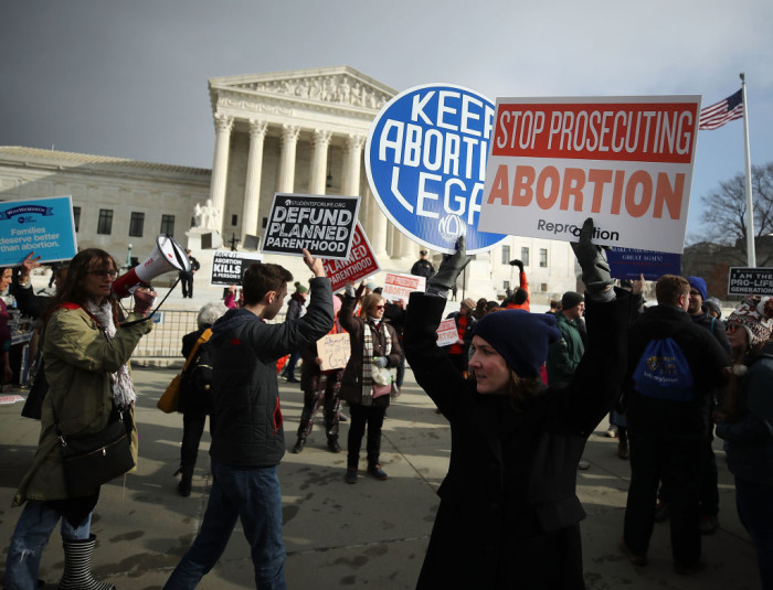 Protesters on both sides of the abortion issue gather in front of the U.S. Supreme Court building during the Right To Life March, on January 18, 2019, in Washington, D.C. The Right to Life Campaign held its annual March For Life rally and march to the U.S. Supreme Court protesting the high court's 1973 Roe v. Wade decision making abortion legal. 