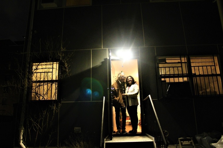 Armando and Sandra Martinez at the backdoor of their affordable home in East New York, Brooklyn.