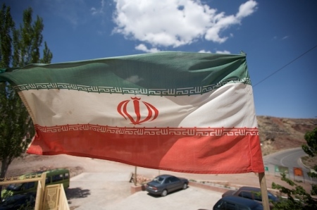 An Iranian flag flies in an Abyaneh mountain village.