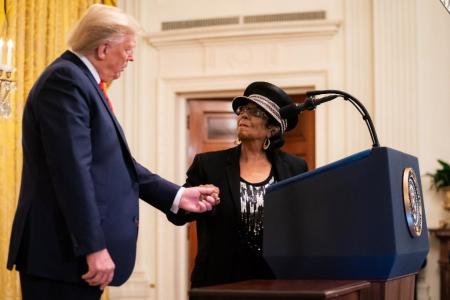 President Donald Trump greets civil rights icon, Gertrude Jane Holliday Stone, 89, who also represents Houston’s National African American Museum at the White House on Thursday February 27, 2020 during a celebration of Black History Month.