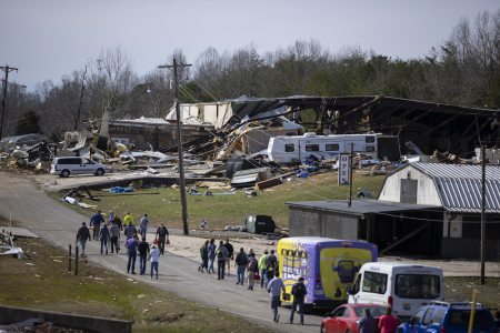 Volunteers work to clean up tornado-damaged areas on March 4, 2020, in Cookeville, Tennessee. 