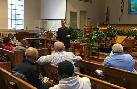 Kentucky Gov. Andy Beshear speaks to churchgoers.