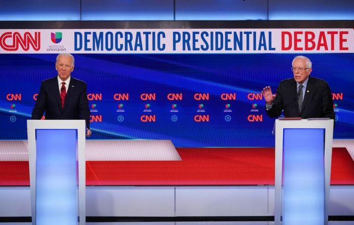 Democratic presidential hopefuls former US vice president Joe Biden (L) and Vermont Senator Bernie Sanders (R) take part in the 11th Democratic Party 2020 presidential debate in a CNN Washington Bureau studio in Washington, D.C., on March 15, 2020. 