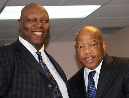 Pastor Terrance 'Big T' Hughes and Democratic Congressman John Lewis from Georgia.