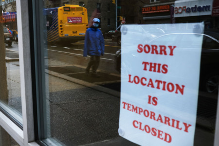 A sign alerts customers that a business in Queens, which has one of the highest infection rates of coronavirus in the nation, is closed on April 03, 2020 in New York City. 