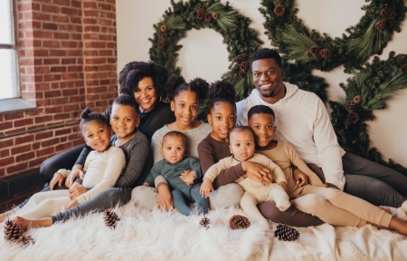 Benjamin and Kirsten Watson, along with their seven children.