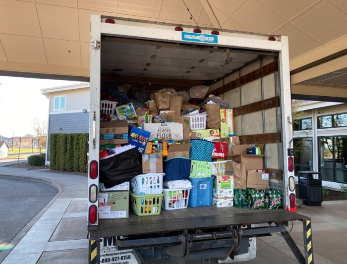 Food items sit on U-Haul truck rented by Abundant Life Church in Portland, Oregon to deliver donated food items. 