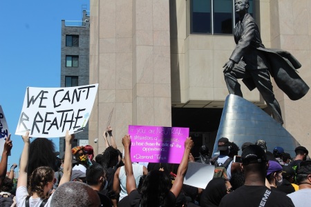 People protest the killing of Minneapolis man George Floyd in Harlem, New York, on May 30, 2020. 