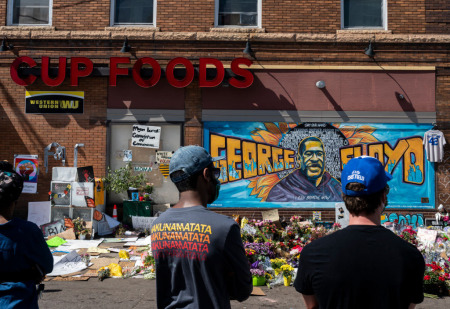 A group of people gather at a memorial for George Floyd on June 3, 2020 in Minneapolis, Minnesota. 