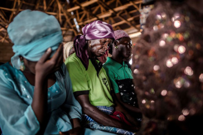 A Christian Adara woman prays while attending the Sunday's service at Ecwa Church, Kajuru, Kaduna state, Nigeria, on April 14, 2019.