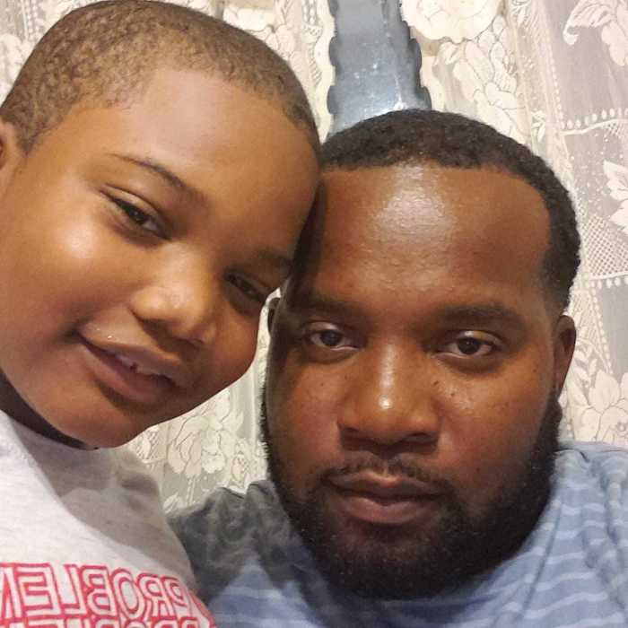 The late Kelvin Wheeler Jr. (R) and his 8-year-old son, Kelvin Wheeler III