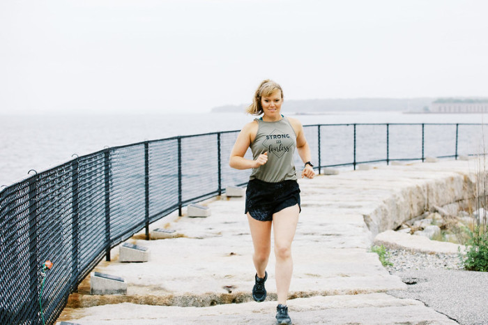 Katie Spotz runs near the coast. Spotz plans to become the first person to run across the state of Maine on September 5 to support Lifewater International.