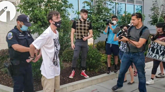 Police arrest Students for Life members outside a Planned Parenthood clinic in Washington, D.C., on Aug. 1, 2020. 