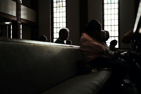 Knoxville residents participate in a service of prayers and hymns for peace in advance of a planned white supremacist rally and counter-protest around a Confederate memorial monument on August 25, 2017 in Knoxville, Tennessee. People congregated at the Second United Methodist Church, one of two churches holding prayer services, to sing, pray and light candles for peace and racial harmony. 