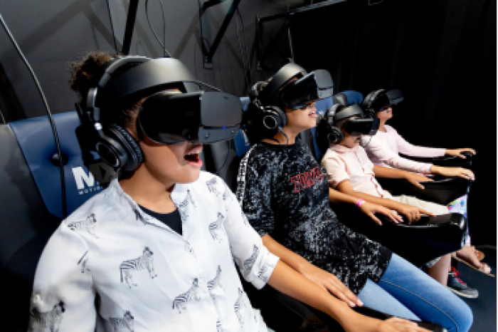 Visitors take part in the 'Truth Traveler' virtual reality experience at the Ark Encounter in Williamstown, Kentucky. 