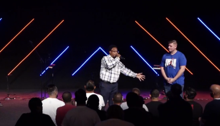 Actor and rapper Orlando Brown (L) testifies about his recovery from addiction at Rise Church in Texas as Jubal Elrod (R) looks on.