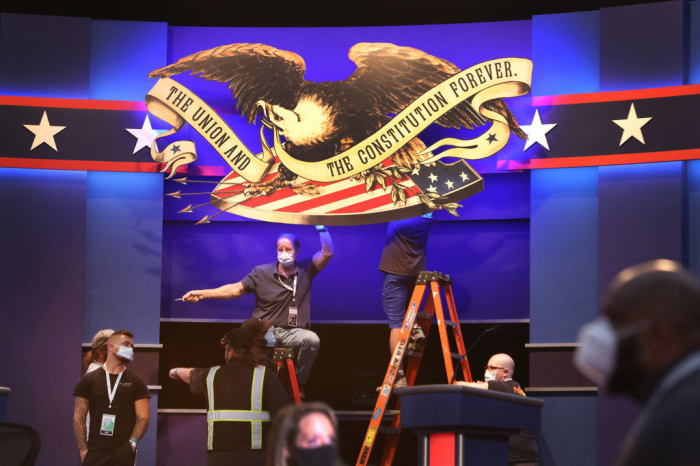 Workers prepare the stage for the first presidential debate between U.S. President Donald Trump and Democratic presidential nominee Joe Biden at Case Western Reserve University and the Cleveland Clinic on September 28, 2020 in Cleveland, Ohio. The first presidential debate will be held tomorrow in Cleveland, Ohio.