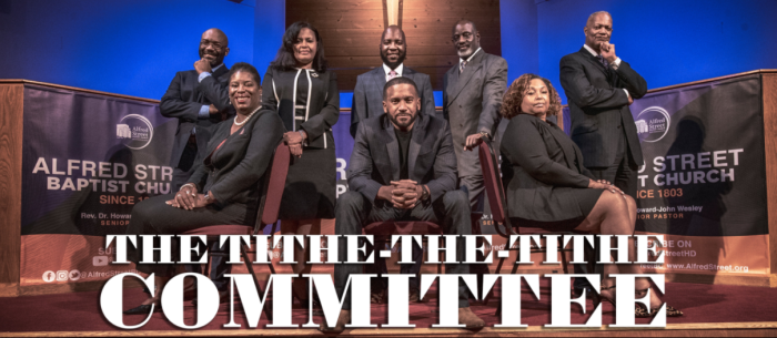 The Rev. Howard-John Wesley (C) and his Tithe-the-Tithe team at the Alfred Street Baptist Church, in Alexandria, Virginia.