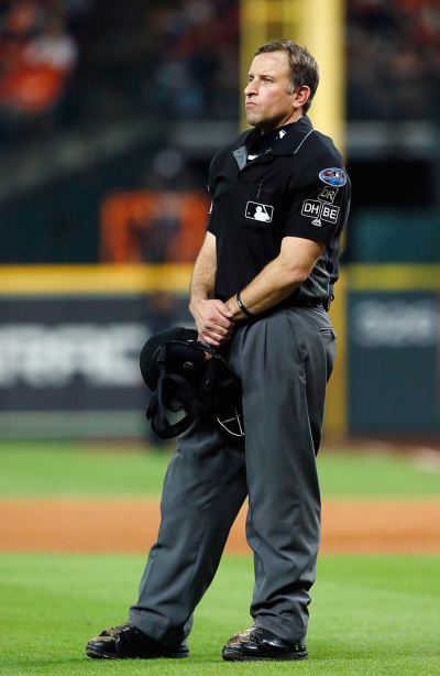 Umpire Chris Guccione looks on during Game Five of the American League Championship Series between the Boston Red Sox and the Houston Astros at Minute Maid Park on October 18, 2018, in Houston, Texas. 