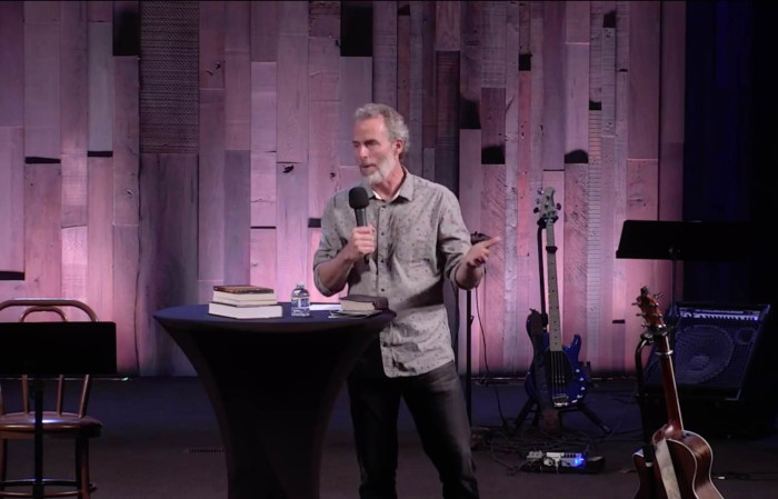 Pastor Mike McClure of Calvary Chapel San Jose speaks to his congregation on Sunday, Nov. 1, 2020, during an in-person service. 