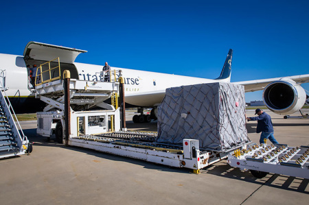 DC-8 aircraft being loaded with winter relief supplies for families in need in Yerevan, Armenia. 