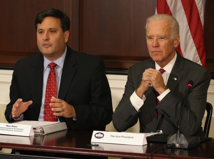 Ebola Response Coordinator Ron Klain (L), joined by U.S. Vice President Joseph Biden (R), speaks during a meeting regarding Ebola at the Eisenhower Executive office building November 13, 2014, in Washington, D.C. 