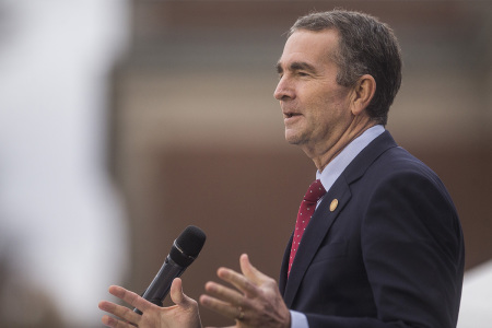 Virginia Gov. Ralph Northam speaks during an unveiling ceremony for Rumors of War, a statue by artist Kehinde Wiley, at the Virginia Museum of Fine Arts on December 10, 2019, in Richmond, Virginia. 