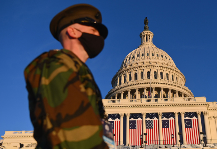 View of the U.S. Capitol as the sun sets ahead of the 59th inaugural ceremony for President-elect Joe Biden and Vice President-elect Kamala Harris in Washington, D.C., on January 19, 2021.