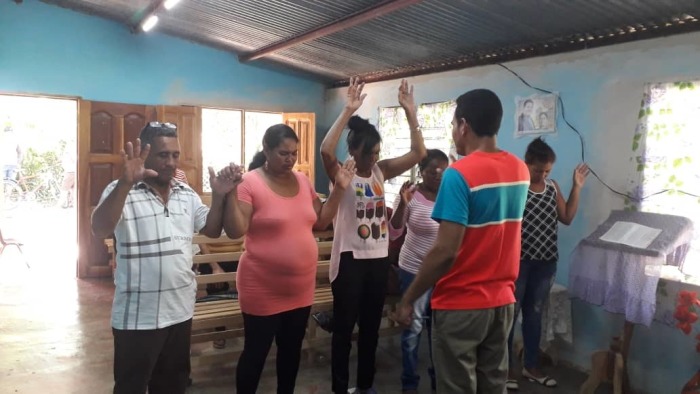 Pastor Parra Rosabal, the pastor of Fuego y Dinámica Apostolic Church in Jobabo, Cuba, worships with his congregation. 