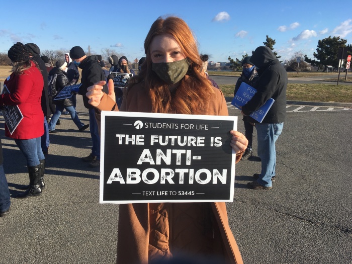 Autumn Lindsey, a student at a community college in Washington state, attends the Life Chain in Arlington, Virginia, Jan. 29, 2021.