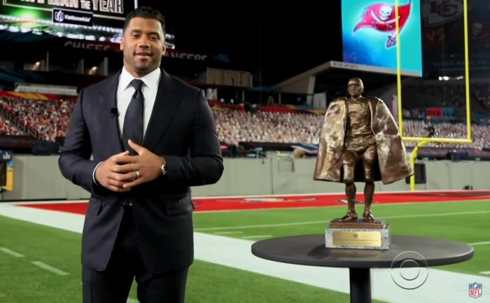 Russell Wilson gives an acceptance speech after winning the Walter Payton NFL Man of the Year Award in Tampa Bay, Florida on Feb. 6, 2020. 